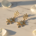 Double Flower Earrings on marble surface